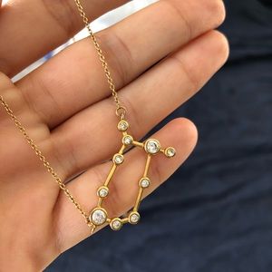 Found at vintage store gemini necklace gold plated